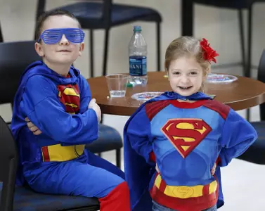 Superheroes Unite to Defend Allen Fieldhouse Against Cowgirls Image