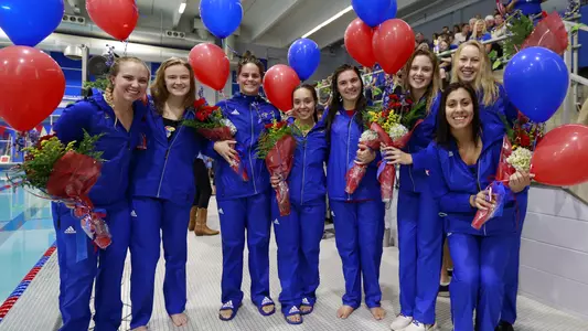 Jayhawks claim first dual victory on Senior Day Image