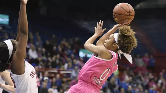 Sooners surge past Jayhawks, 72-52 Image