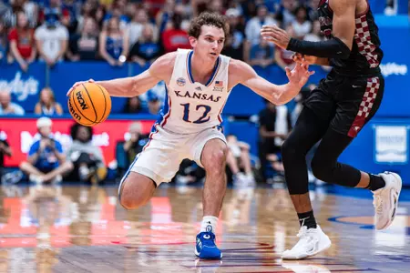LAWRENCE, KS - November 6, 2023 - guard Wilder Evers #12 of the Kansas Jayhawks during the game between North Carolina Central and the Kansas Jayhawks in Lawrence, KS. Photo by Elicia Castillo/Kansas Athletics