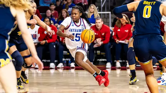 guard Zakiyah Franklin #15 during the game between the Kansas Jayhawks and the Michigan Wolverines during the First Round of the NCAA Women's Basketball Championship . Photo by Angilo Allen/Kansas Athletics