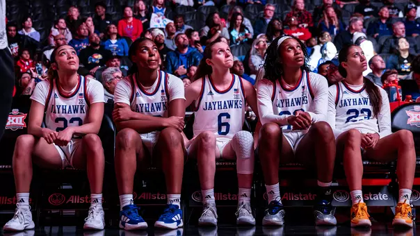 KANSAS CITY, MO - March 5, 2025 - guard Sania Copeland #22 of the Kansas Jayhawks, guard S’Mya Nichols #12 of the Kansas Jayhawks, guard Laia Conesa #6 of the Kansas Jayhawks, center Nadira Eltayeb #33 of the Kansas Jayhawks, Guard Brittany Harshaw #23 of the Kansas Jayhawks during a game vs Texas Tech at the Big 12 Tournament in Kansas City, MO. Photo by Emma Crouch/Kansas Athletics