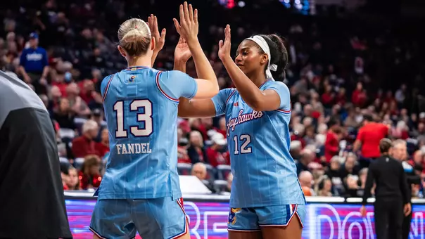 Lawrence, KS - January 20, 2026 - Libby Fandel #13 and S'Mya Nichols #12 during a game against Arizona in McKale Memorial Center in Tucson, AZ. Photo by Kansas Athletics