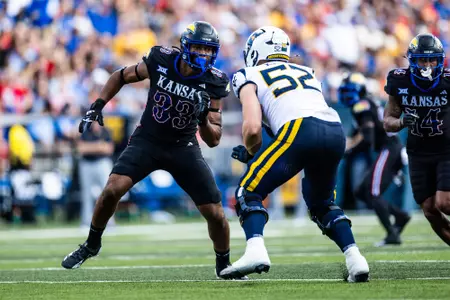 defensive end Leroy Harris III #33 of the Kansas Jayhawks