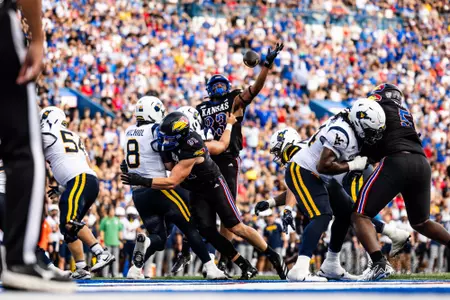 defensive end Leroy Harris III #33 of the Kansas Jayhawks