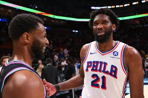 Mar 30, 2026; Miami, Florida, USA; Philadelphia 76ers center Joel Embiid (21) speaks to Miami Heat forward Andrew Wiggins (22) after the game at Kaseya Center. Mandatory Credit: Sam Navarro-Imagn Images