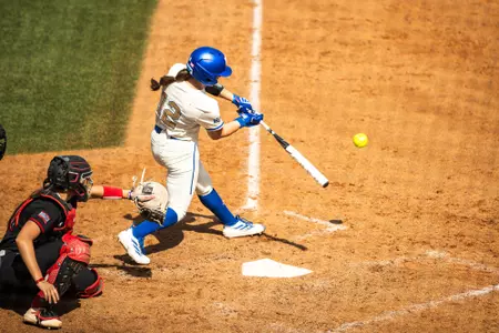 infielder/utility player September Flanagan #12 of the Kansas Jayhawks during the game between the Kansas Jayhawks and the South Dakota Coyotes at Arrocha Ballpark in Lawrence, KS - Photo by Jordan Reyes / KU Athletics