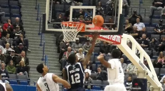 Men's Basketball Hangs Tough, But Falls to #4 UConn Image