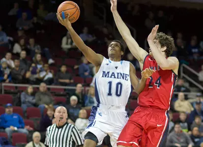 Lawton and Little Lead Attack but Valparaiso Downs Maine Men's Basketball, 93-70 Image