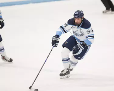 Men's Ice Hockey Skates Past Merrimack 4-3 Image
