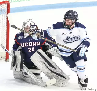 colton in front of uconn net