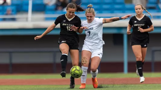 Kristina Kelly battles for a ball against Bryant.