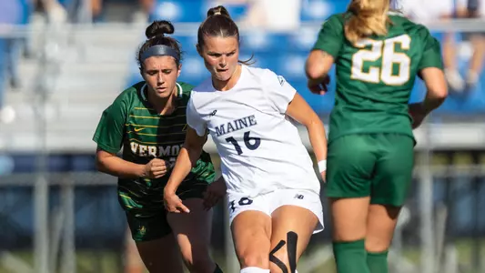 Delaney Labonte kicks a ball against Vermont.