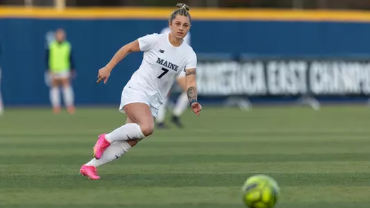 Kristina Kelly chases a ball up the field.