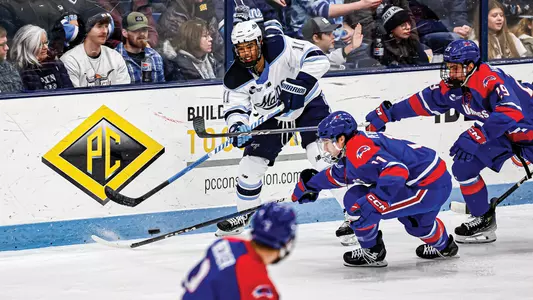Donavan Villeneuve-Houle battles against the boards.