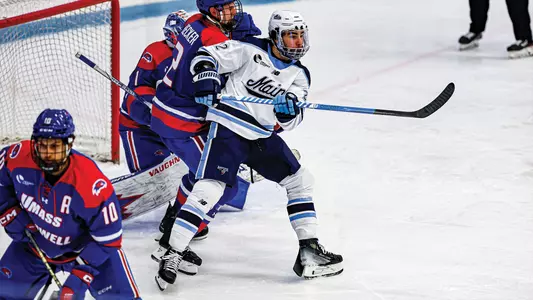 Harrison Scott battles for position in front of the net.