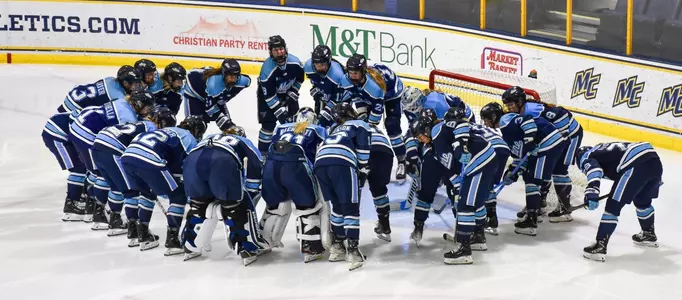 WIH team huddle