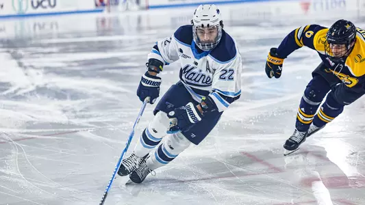 Harrison Scott with the puck.