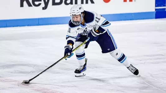 Charlie Russell with the puck