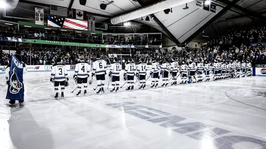 Maine men's hockey stands on the blue line.