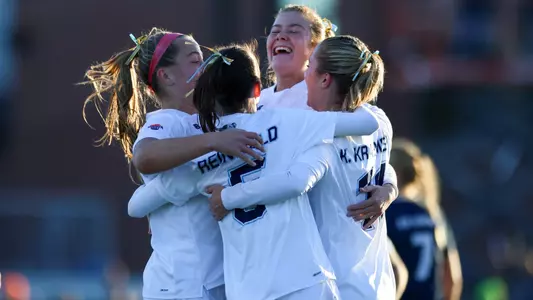 women's soccer celebrates a goal