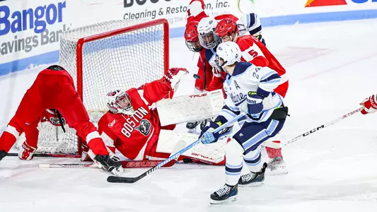 Nolan Renwick watches his shot against BU.