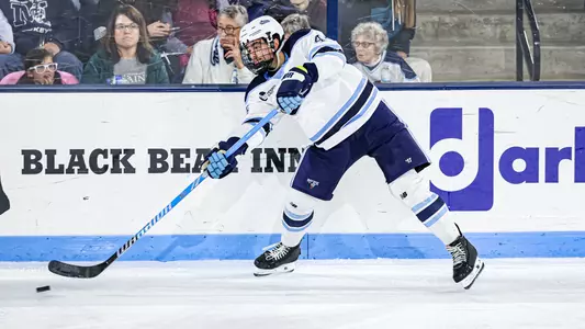 Frank Djurasevic shoots the puck.