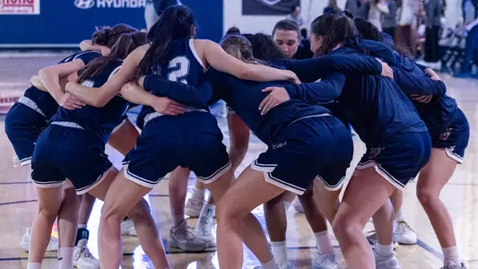 huddle-blue-quinnipiac