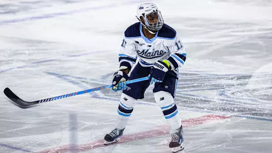 Ross Mitton skates through the neutral zone.