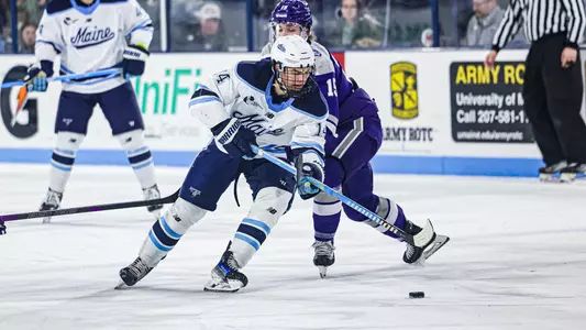 Sully Scholle carries the puck.