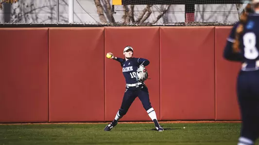 Keira Inman throws the ball in from the outfield.