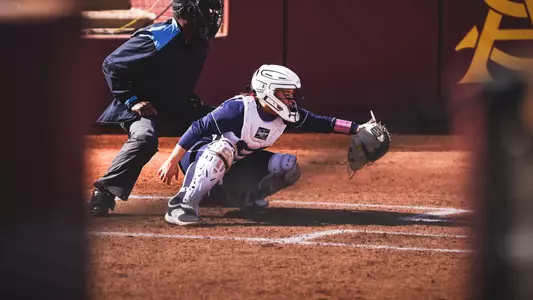 Kennedy Priest behind the plate.