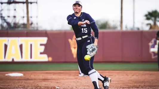 Cat Fallon pitches the ball.