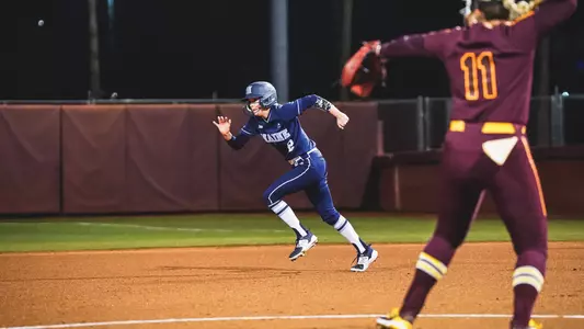 Kennnedy Burns runs to second.