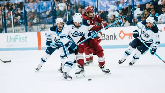 Liam Lesakowski battles for the puck against UMass