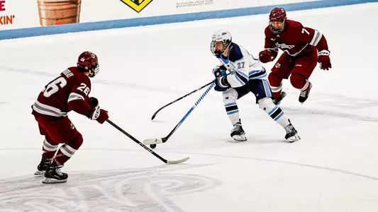 Lynden Breen carries the puck