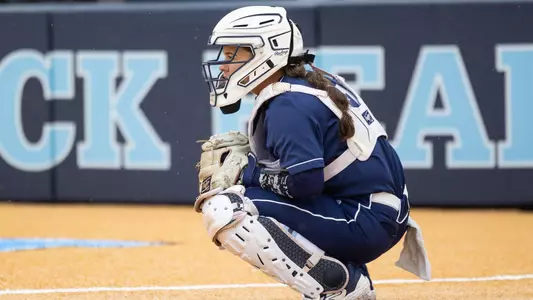 Kennedy Priest catches behind the plate/