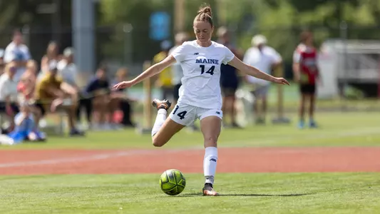 Ella Vermilya dribbles up the field.