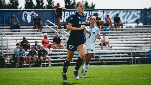 Julie Lossius runs up the field