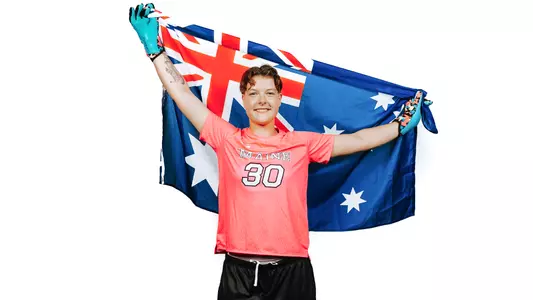 Grace Wilson with an Australian flag.