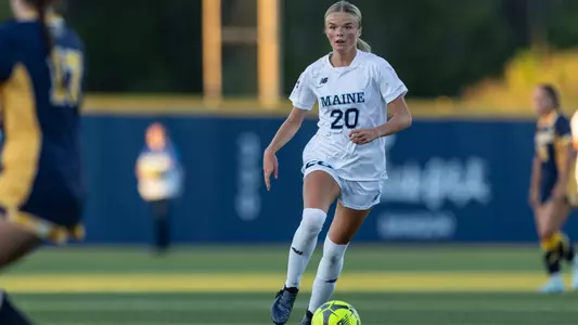 Tegan Morrison dribbles the ball.