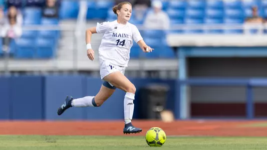 Elle Vermilya runs after the ball.