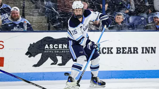Nicholas Niemo passes the puck.