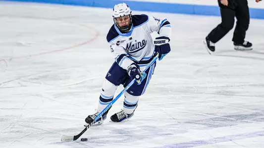 Brandon Chabrier carries the puck up the ice.