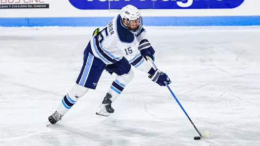 Brandon Chabrier skates with the puck.