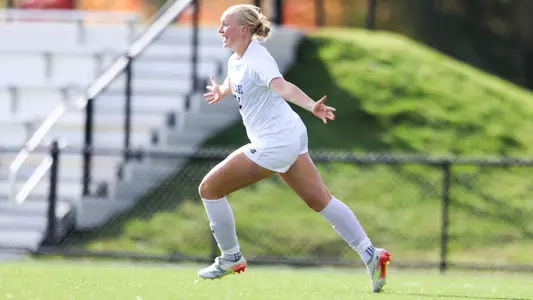 Britta Denny celebrates a goal.