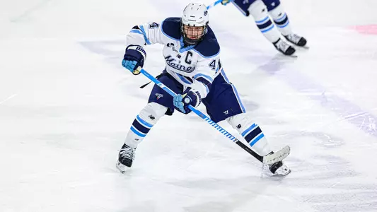 Brandon Holt passes the puck