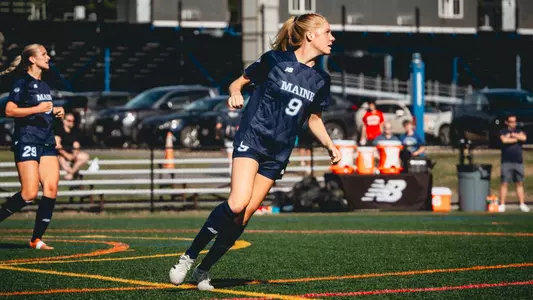 Abbey Thornton runs up the field.