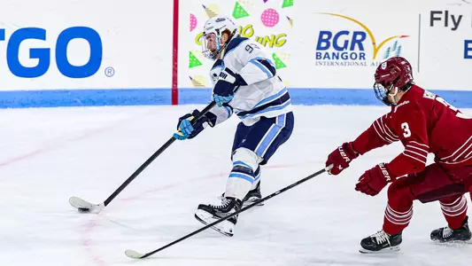 Justin Poirier handles the puck.
