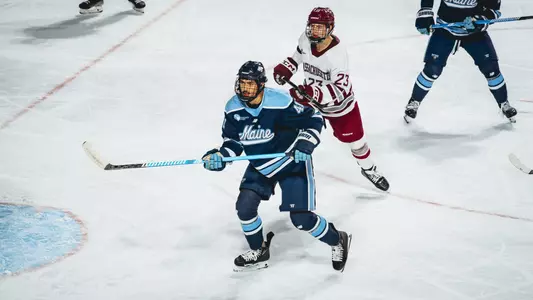 Jaden Lipinski in front of the net at UMass